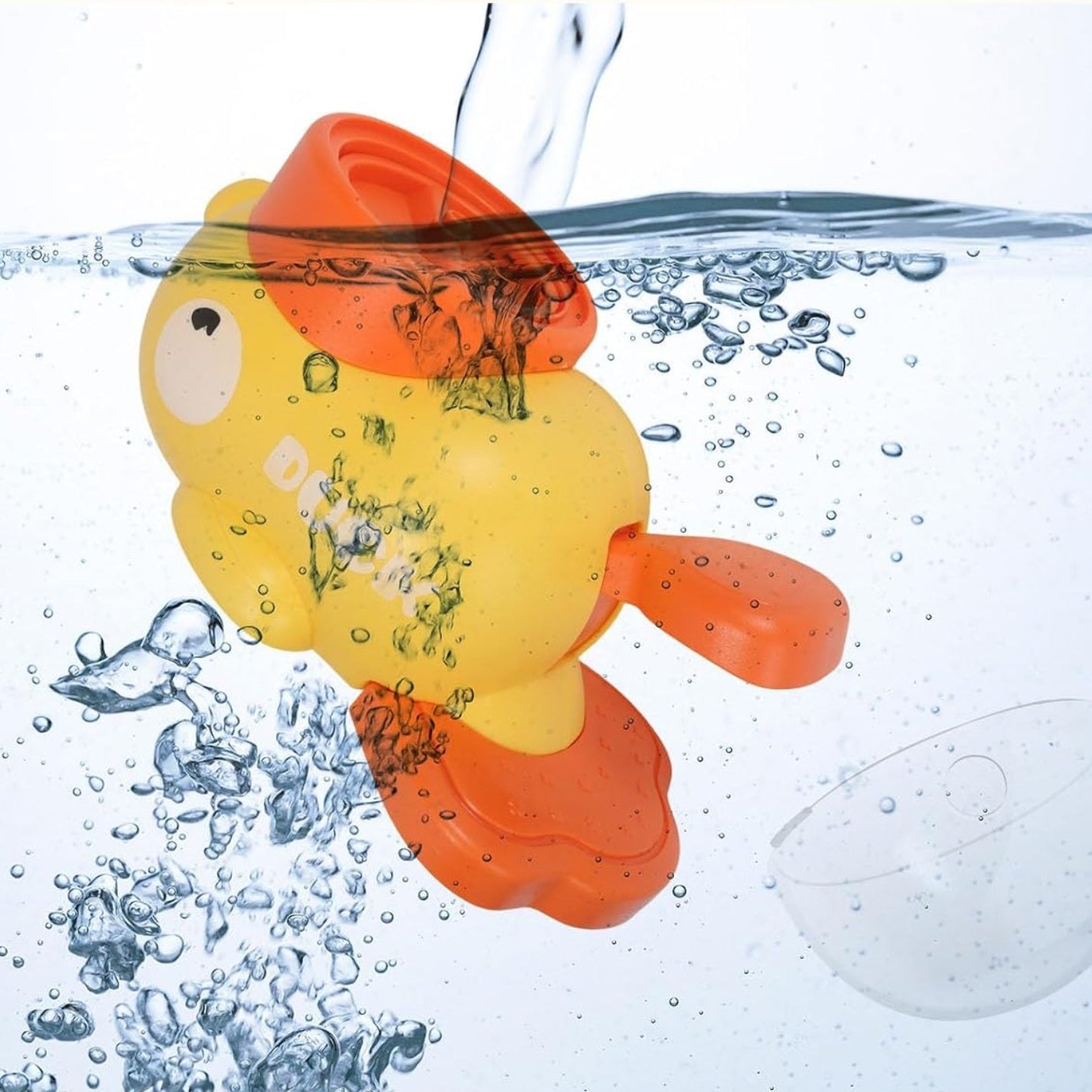 Colorful fish-shaped toy being submerged in water with bubbles, labeled 'EASY TO CLEAN!'.